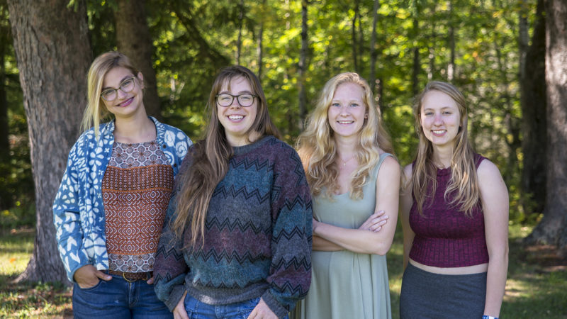 Four eco-rep students outdoors